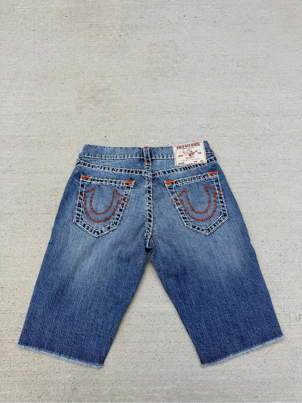 Denim Cutoff Bermuda Shorts in Medium Blue